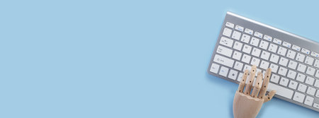 Computer keyboard pad on blue background, minimal style. Flat lay home office desk. Workspace  with...