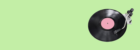 Abstract record player part isolated on green background. Disk Jockey turntable and vinyl. Retro...