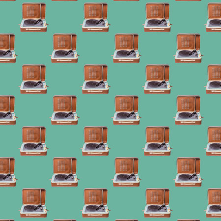 Seamless pattern. Abstract record player part isolated on green background. Disk Jockey turntable and vinyl. Retro music concept.の写真素材