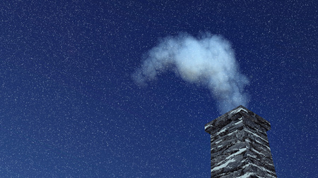 Close-up of the old house chimney with smoke against dark blue sky at snowfall nightの写真素材