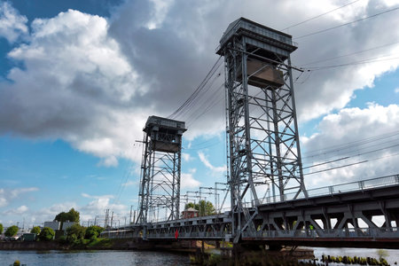 Low angle view of two metal frame construction towers of old historical two-tier bridge against...