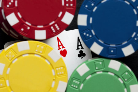 Aces and chips on a gambling table