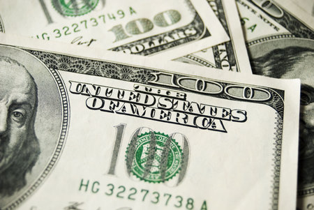 many banknotes of hundreds dollars 