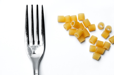 pasta and fork isolated on white background , mediterranean dietの写真素材