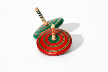 Red and green spinning top の写真素材