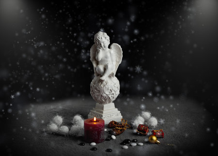 angel with wings figurine toy ornament figurine for christmas with snow holidayの写真素材