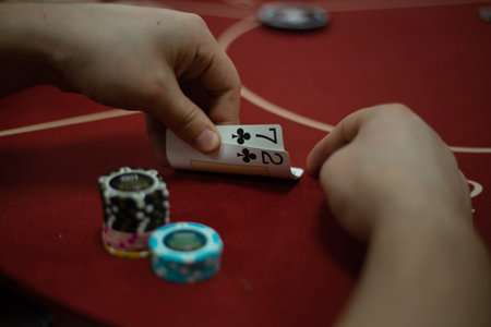 Texas club poker tournament which was in Ukraine in Kyiv in September 2020. Texas Holdem fans gathered together to play sports poker cards. High quality photoのeditorial素材