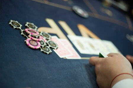 Texas club poker tournament which was in Ukraine in Kyiv in September 2020. Texas Holdem fans gathered together to play sports poker cards. High quality photoのeditorial素材