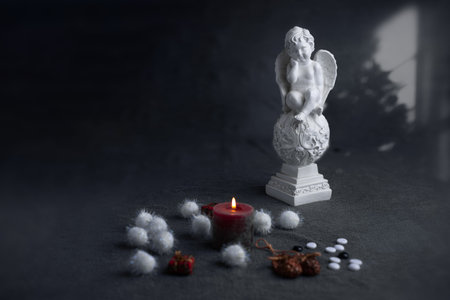 angel with wings holiday christmas candle figurine statue ornament beautiful decoration . High quality photoの写真素材