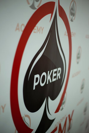Texas club poker tournament which was in Ukraine in Kyiv in September 2020. Texas Holdem fans gathered together to play sports poker cards. High quality photoの写真素材