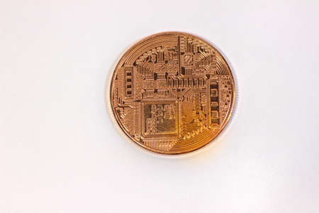 Physical bitcoin coin. Bitcoin on white background. Bitcoin cryptocurrency on white canvas.の写真素材
