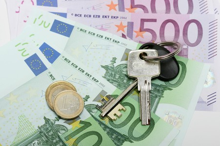 Euro banknotes with various coinsの写真素材