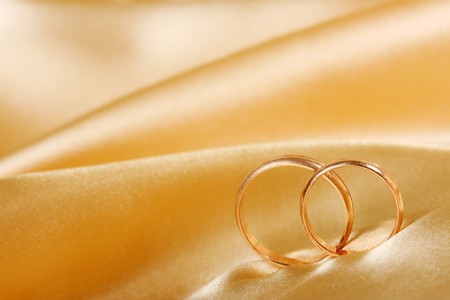 wedding rings can be used as a backgroundの写真素材