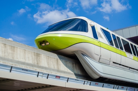 Monorail train leaving Magic Kingdom in Disney World, Orlando, Florida, USAのeditorial素材