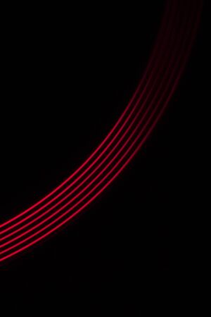 red light lines on a black backgroundの写真素材
