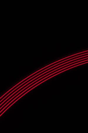 red light lines on a black backgroundの写真素材
