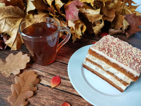 warm autumn tea party with a delicious cake