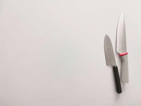 kitchen knives on a gray table background