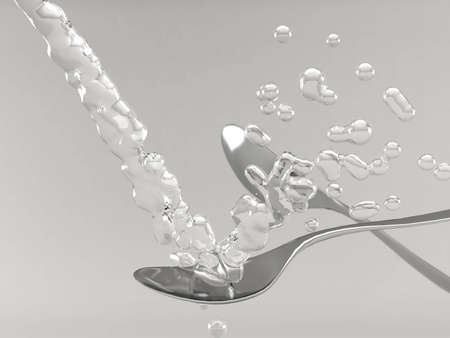 Spoons and water の写真素材