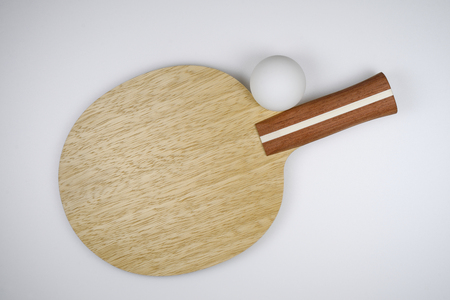 Ping Pong ball and racket, isolated in white backgroundの写真素材