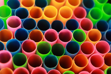 Closeup shot of bunch of colorful plastic drinking strawsの写真素材