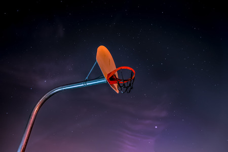 Basketball Hoop on the background of the starry skyの写真素材