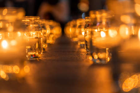 Many burning candles with shallow depth of field, Candles in a churchの写真素材