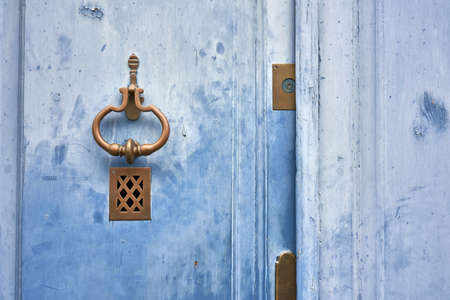 Old blue wooden door closeupの写真素材