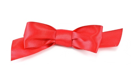 Red satin bow, isolated on white backgroundの写真素材
