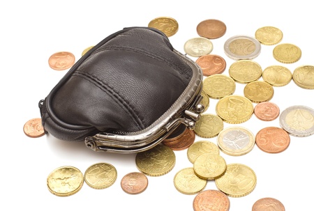 Black leather purse and several euro coins on white backgroundの写真素材