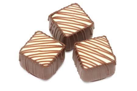 Chocolate pralines isolated on white backgroundの写真素材