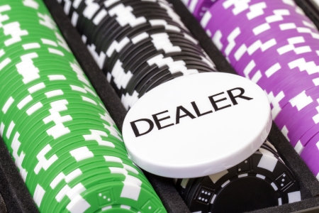 Set of poker chips and dealer button, closeupの写真素材