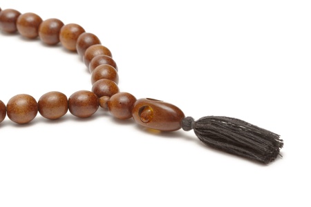 Wooden rosary on white backgroundの写真素材