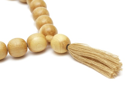 Wooden rosary on white backgroundの写真素材