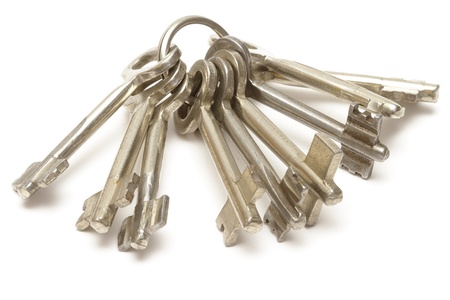 Bunch of keys isolated on whiteの写真素材