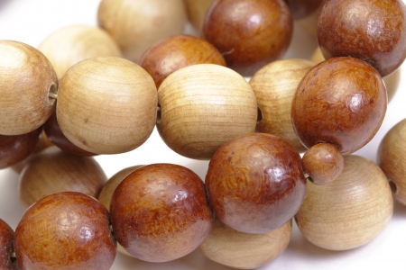 Wooden rosary on white backgroundの写真素材
