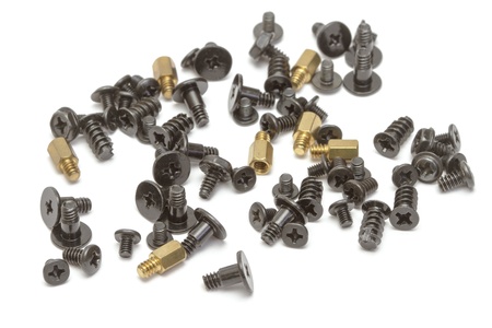 Metallic screws on white backgroundの写真素材
