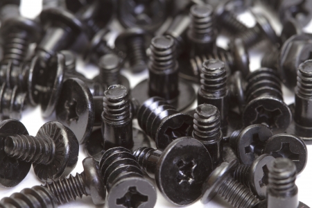 Metallic screws as backgroundの写真素材