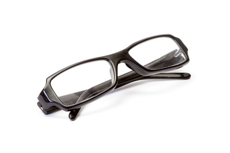 Black plastic glasses on white backgroundの写真素材