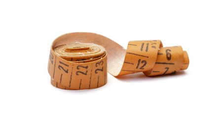 Measuring tape of the tailor isolated on whiteの写真素材