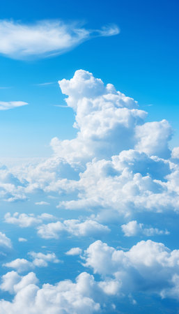 Blue sky and white clouds background. Cumulus clouds in the clear sky.の素材