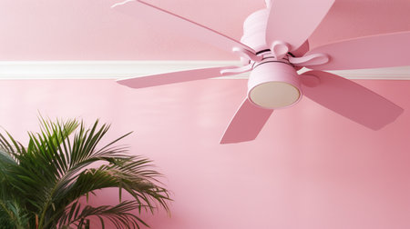 Ceiling fan with palm leaves on pink background. 3d renderingの素材