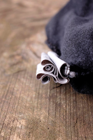 Clothing labels on wooden vintage backgroundの写真素材