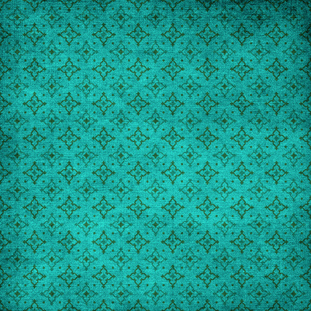 turquoise background with pressed ornamentの写真素材