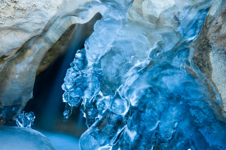 Beautiful ice formations on a frozen riverの写真素材