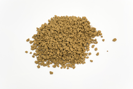 High Angle Close Up Detail of a Pile of Akadama Soil Isolated on White Backgroundの写真素材