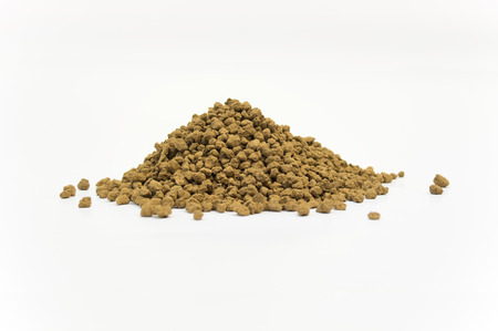 Close Up Detail of a Pile of Akadama Soil Isolated on White Backgroundの写真素材