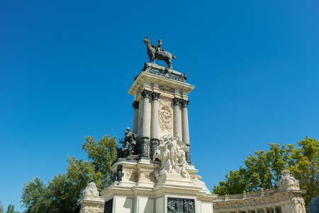 Monument of Alfonso XII Detail, The Peace and The Progress sculpture groups, Pond of the Park of the Pleasant Retreat, Madrid, Spainのeditorial素材