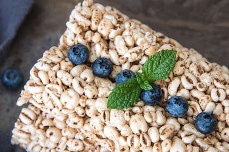 Grain rice cakes with blueberries for healthy breakfast. Healthy snack.