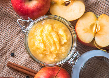 Fresh homemade apple sauce in a jar, top viewの写真素材